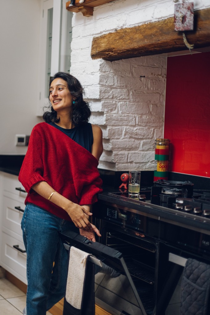 Ambica at home in her kitchen